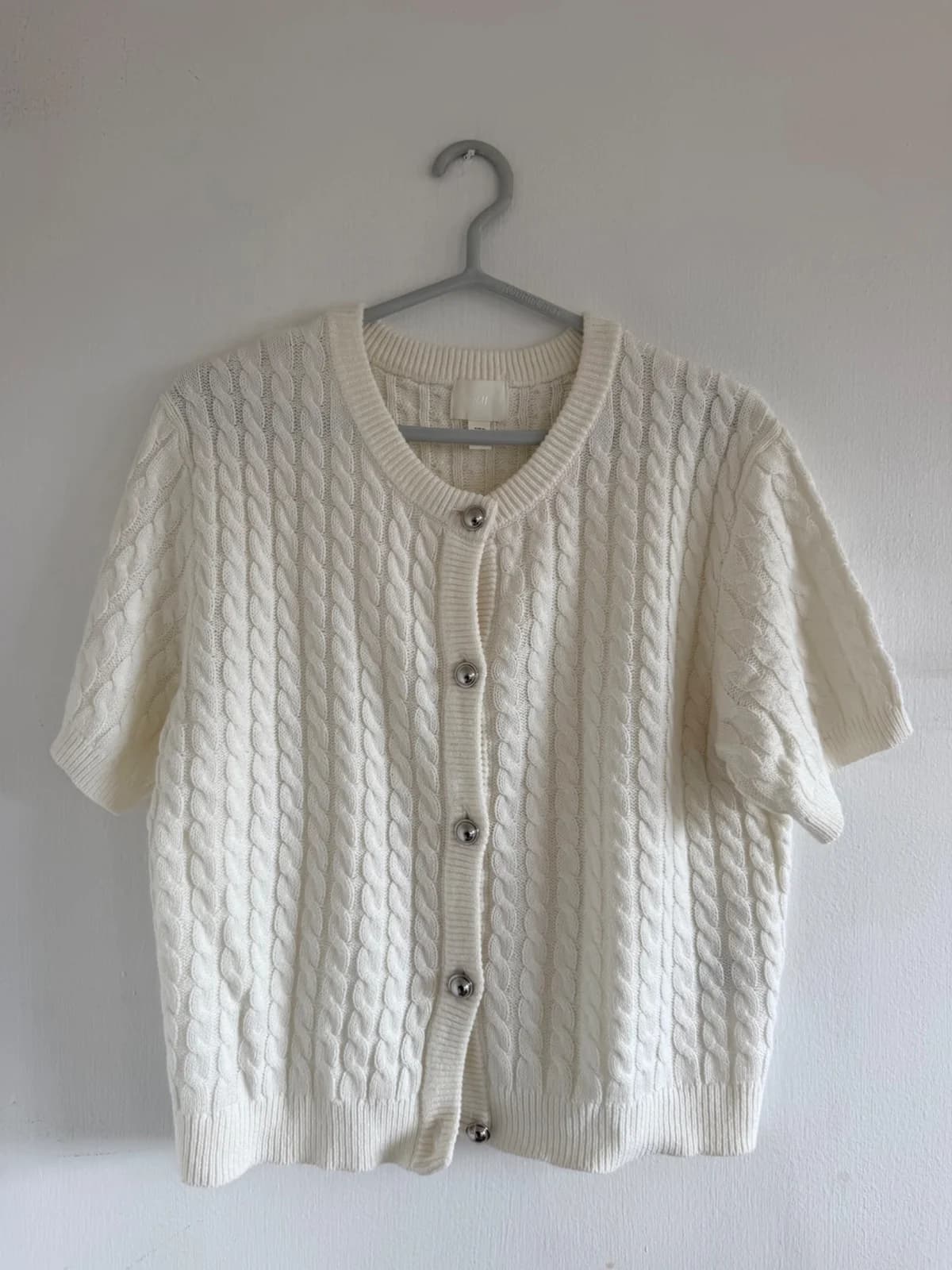 Usado por Isidora Fuenzalida Costa, Polera tejida manga corta , talla XL