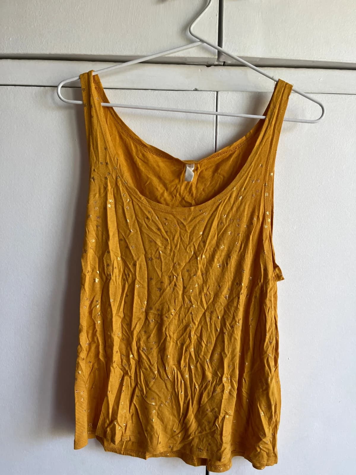 Usado por Amanda Wilson, Top Opposite, talla S
