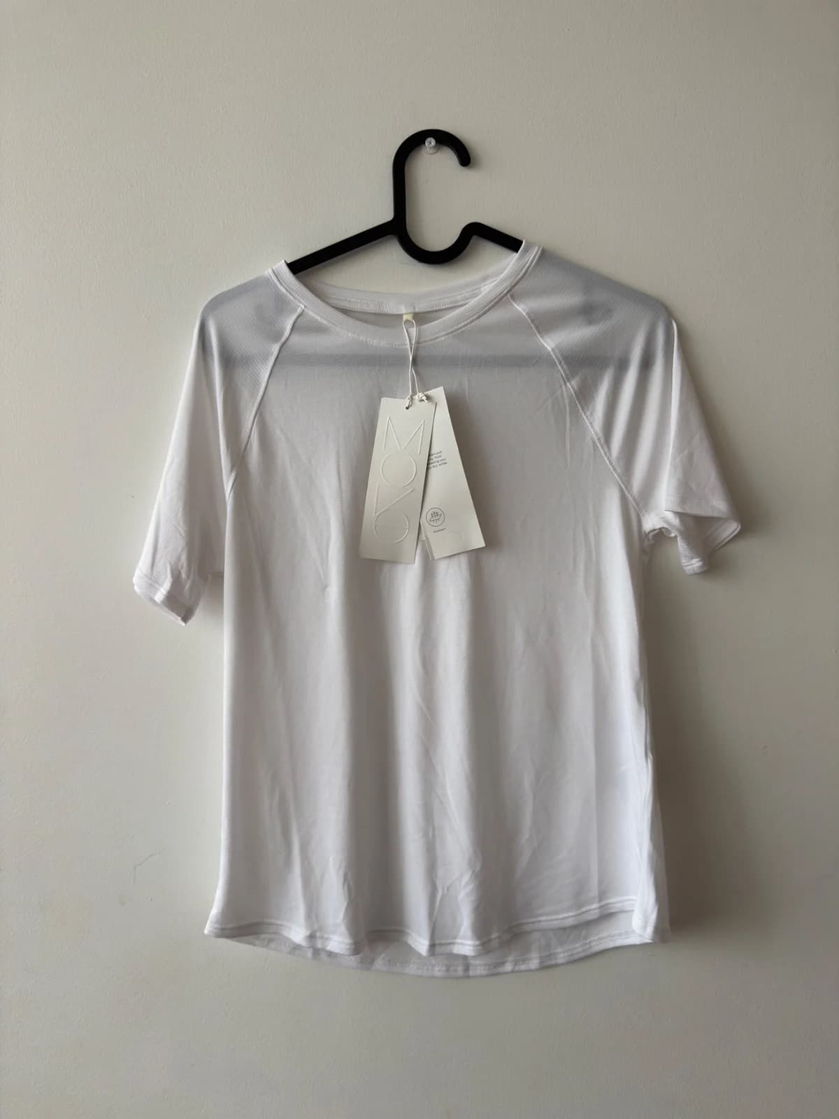 Usado por Monserrat Salazar, Polera Deportiva H&M Move, talla XS