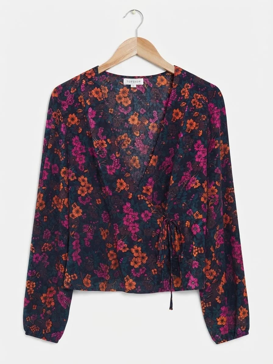 Blusa floreada con lazo — foto 1