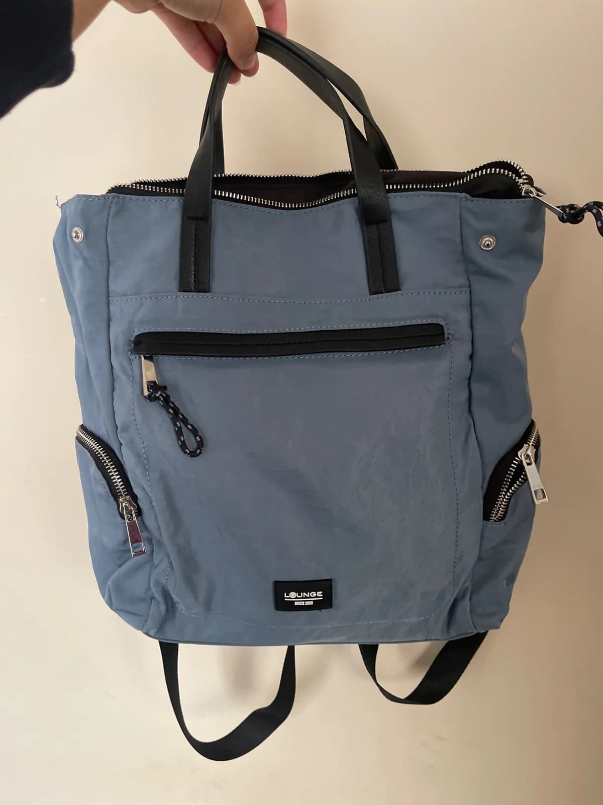 Usado por Maura Camacho Aliaga, Mochila lounge celeste/azul, talla M