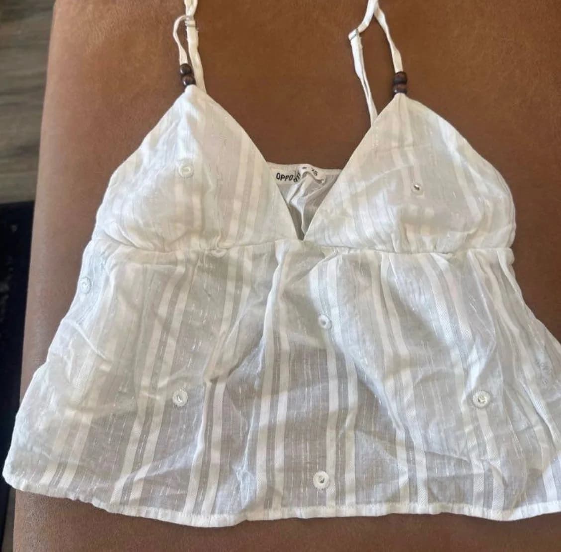 Usado por María de los Ángeles Esveile Molina , Polera blanca opposite XS, talla XS