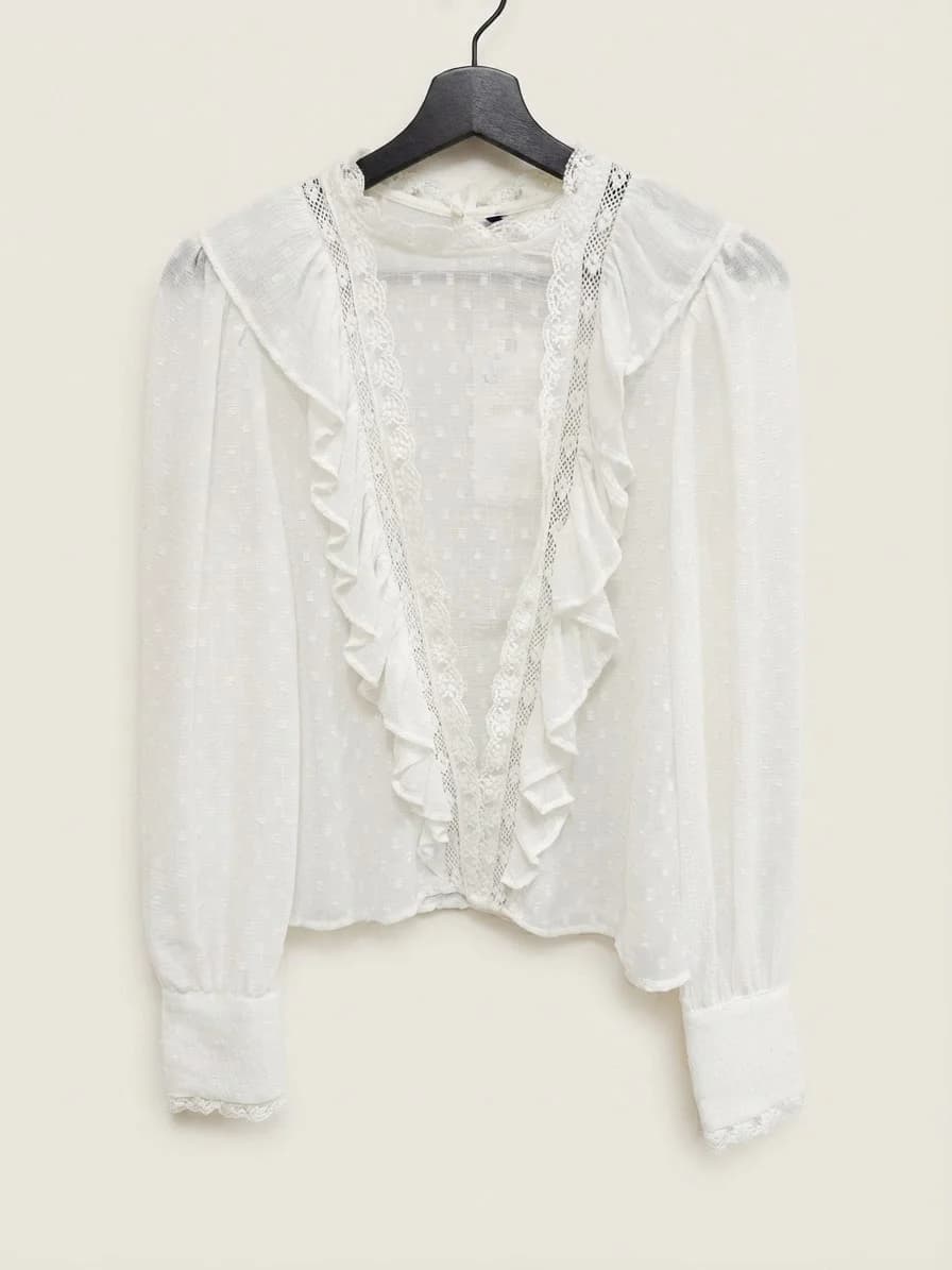 Usado por Marcela Iribarren , Blusa con volantes Zara, talla XS