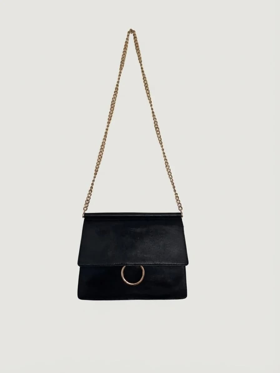 Usado por Gracia Labraña, Cartera tipo sobre Forever 21