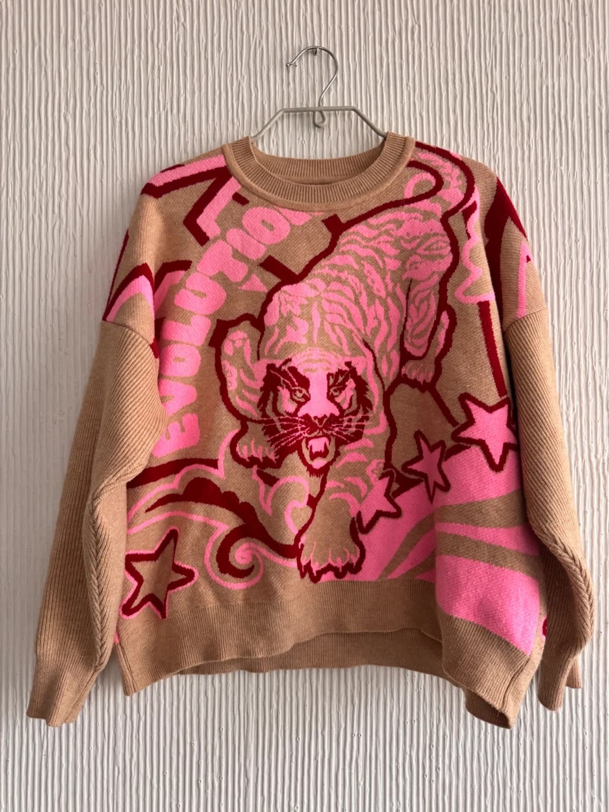 Usado por Montserrat Silva, Sweater tigre Cata Escorza, talla S/M